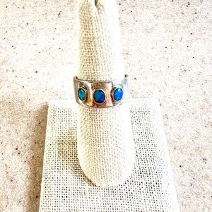 3 Australian Opals set in 14 KT Gold on Sterling Silver Band